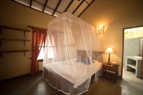 Postel nebo postele na pokoji v ubytování Anawasal