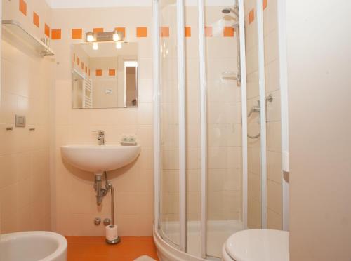 a bathroom with a sink and a shower at Ai Tagliapietra in Venice