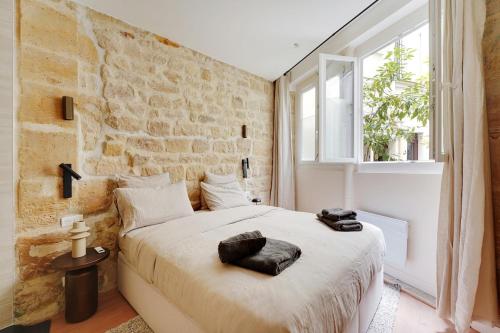 Appartement haut de gamme avec 2 salles de bains et climatisation au cœur du Marais