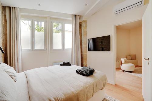 Appartement haut de gamme avec 2 salles de bains et climatisation au cœur du Marais