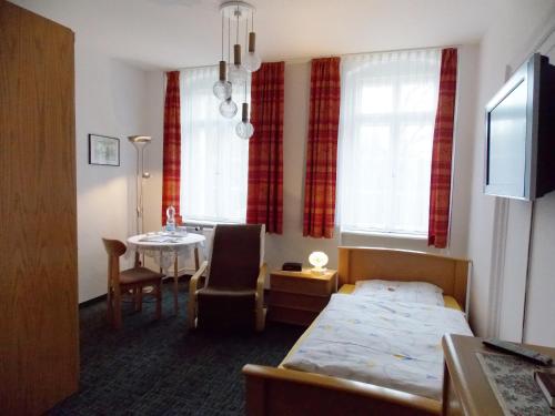 Postel nebo postele na pokoji v ubytování Kurheim Haus Linde