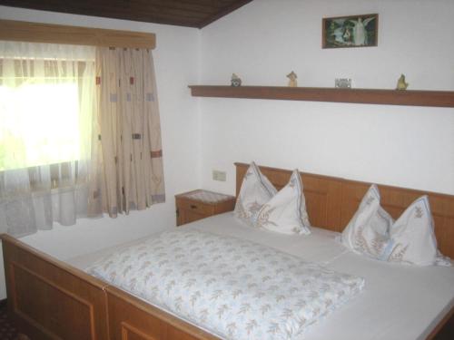 Una cama o camas en una habitación de Funerhof