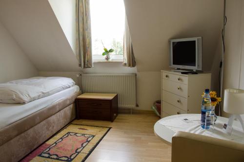 TV a/nebo společenská místnost v ubytování Hotel zum Rücking