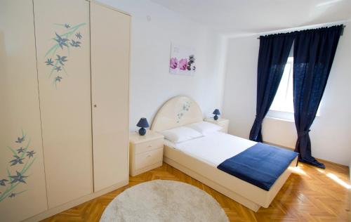 Cama ou camas em um quarto em Apartments Kate Postira