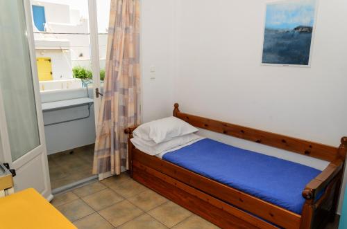 En eller flere senge i et værelse på Hotel Livadia