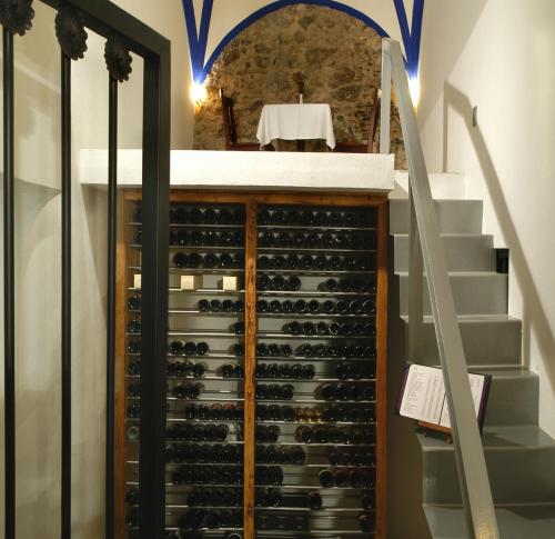 a wine cellar with a bunch of wine bottles at Casona de la Republica Hotel Boutique & SPA in Querétaro