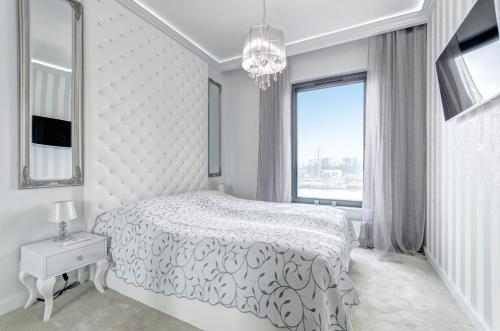 Posteľ alebo postele v izbe v ubytovaní Luksusowy Apartament Good Morning Gdansk