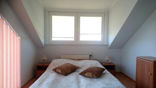 Postel nebo postele na pokoji v ubytování Willa Sarenka