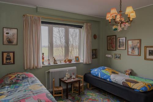 Postel nebo postele na pokoji v ubytování Hotel Lolland