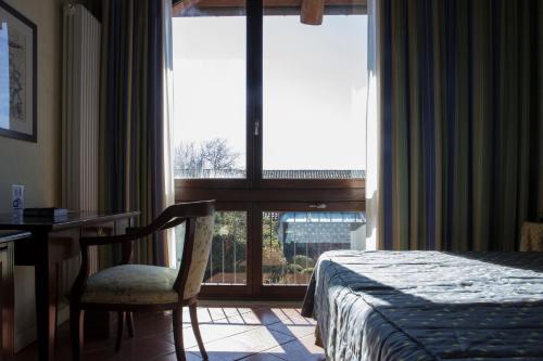 เตียงในห้องที่ Tenuta La Cascinetta