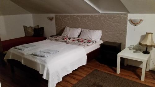 Postel nebo postele na pokoji v ubytování Guest house Elit