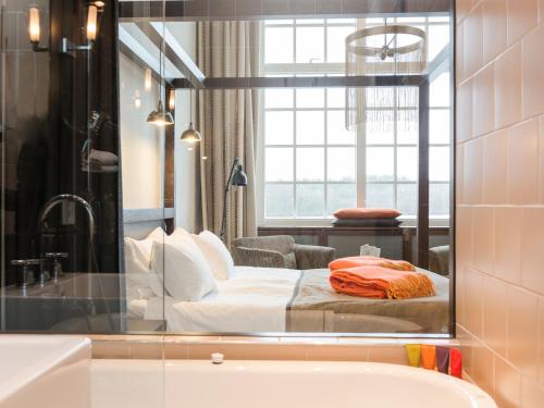Koupelna v ubytování Nääs Fabriker Hotell & Restaurang
