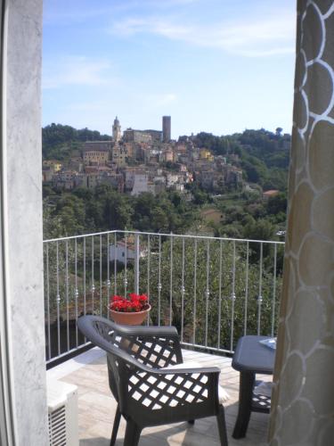 a balcony with a view of a city at la casetta del nonno in Arcola