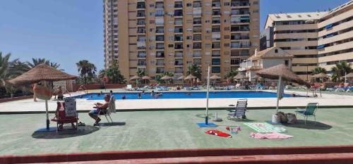 Las Palmeras - Seafront Apartment for 6 with Glazed Terrace and Marina Views