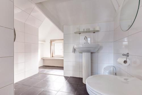 Koupelna v ubytování Hotel Stad en Land