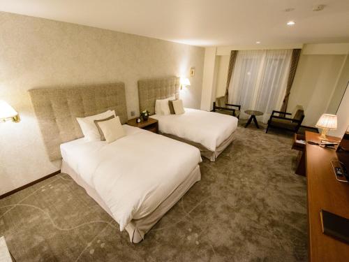 Cama o camas de una habitación en Le Grand Kyu Karuizawa
