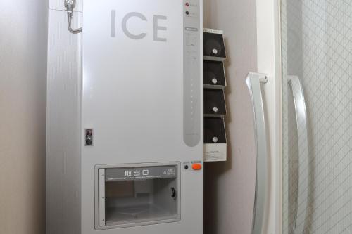 a refrigerator with an ice machine in a room at Tokyo Bay Ariake Washington Hotel in Tokyo