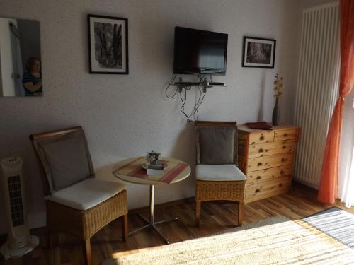 Televisyen dan/atau pusat hiburan di B&B Pension Winzerhaus Zell-Mosel