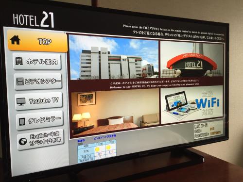a television screen with a hotel website on it at Hotel 21 in Kusatsu