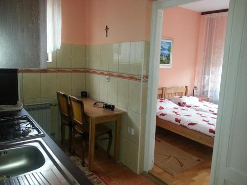 Ένα ή περισσότερα κρεβάτια σε δωμάτιο στο Setnik Guesthouse