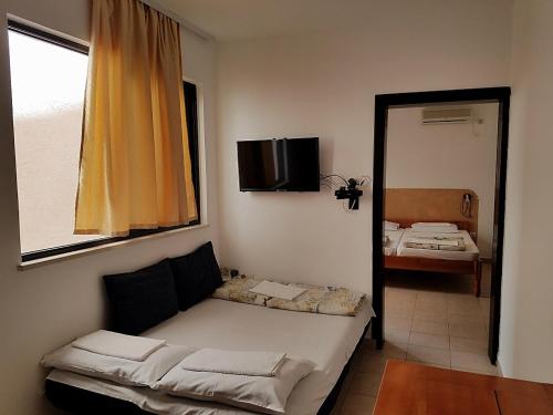 Cama o camas de una habitación en VLSB Apartments