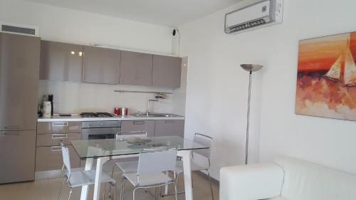 Η κουζίνα ή μικρή κουζίνα στο Villa Carrubbedda