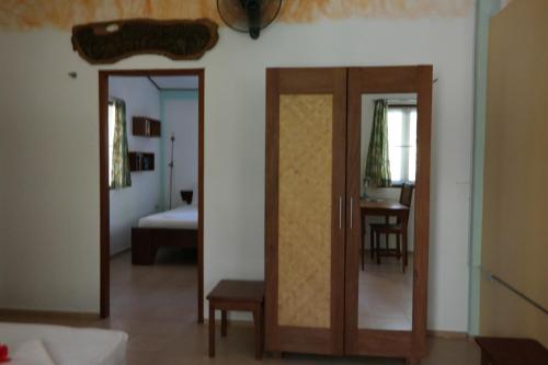Katil atau katil-katil dalam bilik di Lake View Bungalows