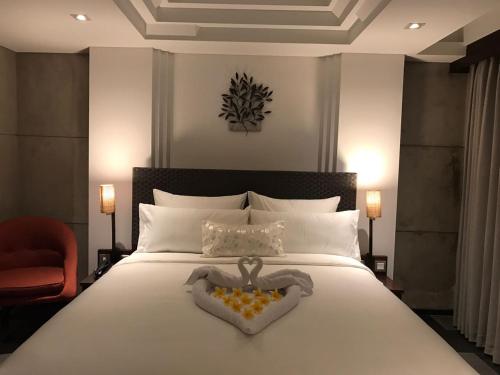 Katil atau katil-katil dalam bilik di Anshel Hotel Seminyak