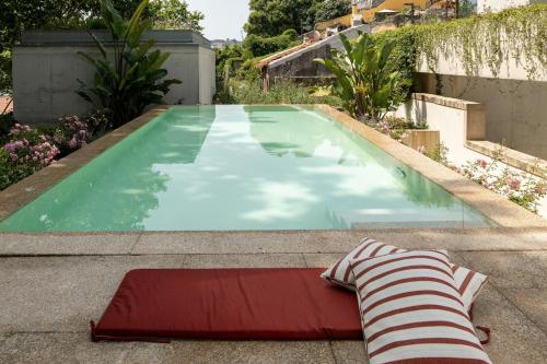 Calm Garden Residence with Pool by Reframe