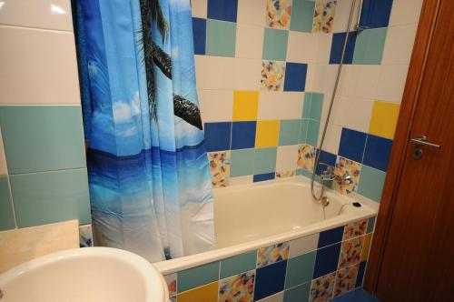 Ett badrum på AlgarveFlat