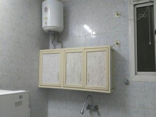 Ett badrum på Al Eairy Apartments- Tabuk 4