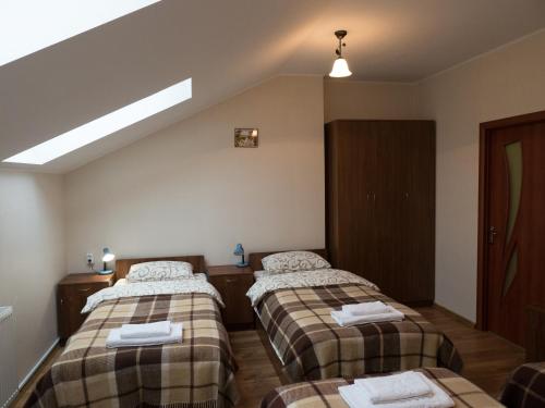 Postel nebo postele na pokoji v ubytování City Hostel