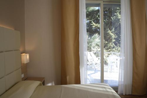 Hotel Napoleonにあるベッド