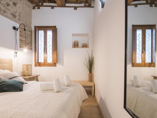 Madera y Piedra - Apartamentos Aloha Toledo