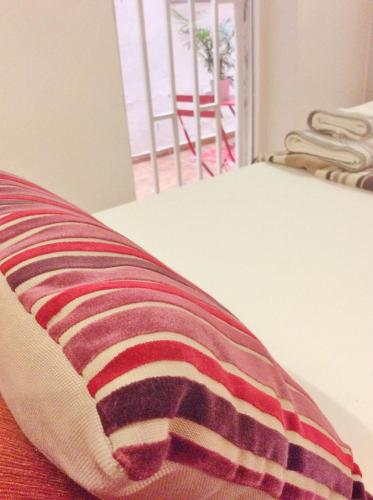 Een bed of bedden in een kamer bij Apartamento Delicias