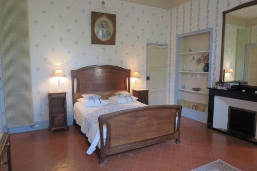 Postel nebo postele na pokoji v ubytování Le Domaine de Fraissinet