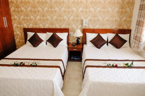 Cama o camas de una habitación en Phan Rang Hotel