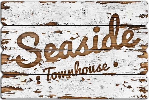 a wooden sign with the words savannahahoahoahooke at Seaside-Townhouse in Timmendorfer Strand