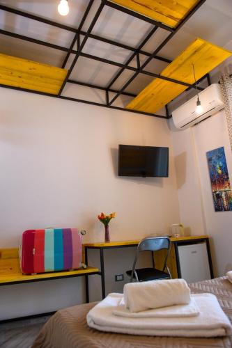 B&B L'Officina di Apolloにあるテレビまたはエンターテインメントセンター