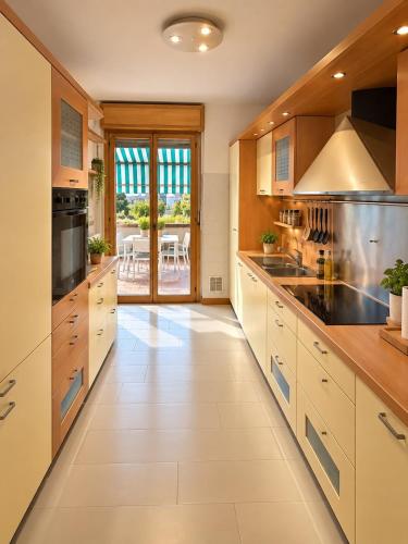 Big apartment with terrace near the stadium with parking and wifi
