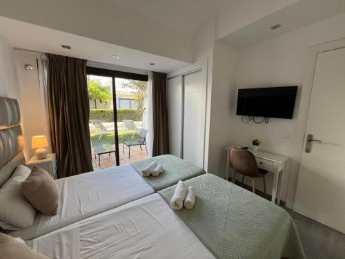Estepona - Playa - Villa de 2 dormitorios con terrazas al lado del mar AL7