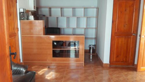 Kuchyň nebo kuchyňský kout v ubytování Hostal Casa Flores