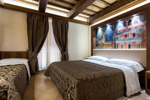 Lova arba lovos apgyvendinimo įstaigoje Hotel La Terrazza RESTAURANT & SPA