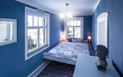 Säng eller sängar i ett rum på Ferienapartments Gohrisch Villa Schönblick