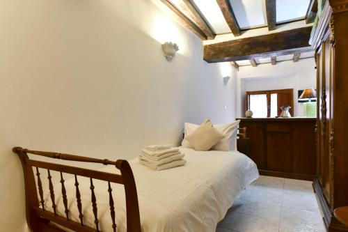 a bedroom with a bed with towels on it at Loft Pantheon in Rome