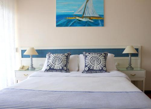 Cama ou camas em um quarto em Hotel San Martin
