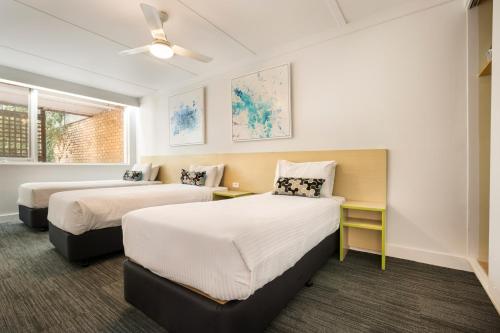 Tempat tidur dalam kamar di Nightcap at Coolaroo Hotel