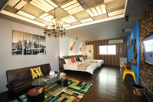 Postel nebo postele na pokoji v ubytování First Place B&B (Hualien Railway Station)
