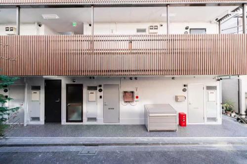 Kagurazaka SAIEI HOTEL 201 ,10 minutes by subway to Ginza , 15 minutes to Shinjuku , Ikebukuro , features 2 bedrooms, a living room, and 4 beds