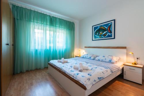 Apartments with parking space Novi Vinodolski - 2416